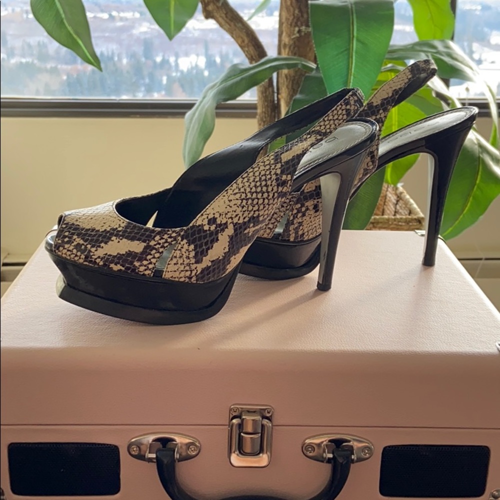 Snakeskin platform high heel,worn,runs big in size